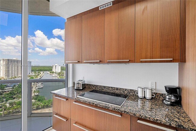 Building Photo - 15811 Collins Ave