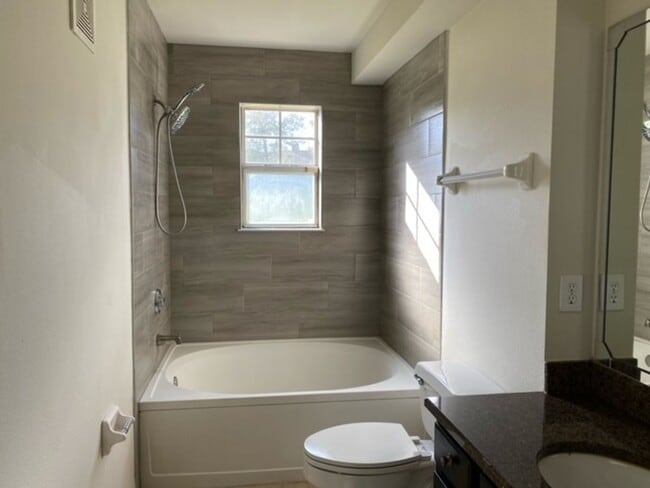 Building Photo - Welcome home to these beautifully Condo in...