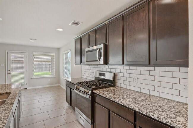 Building Photo - 5611 Cedar Cres Ct