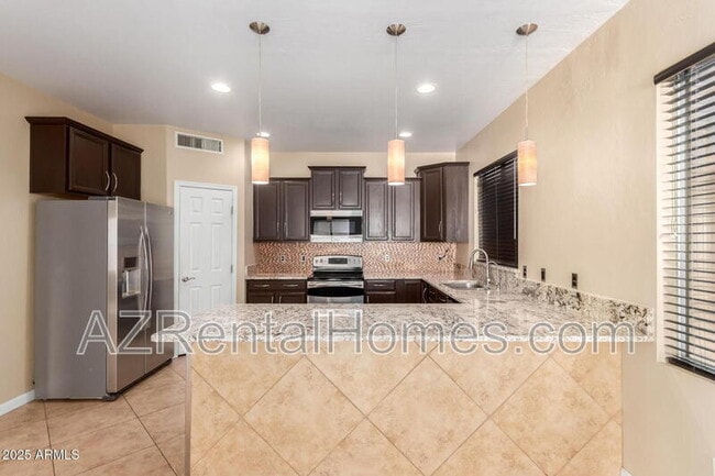 Building Photo - 8721 E Lomita Cir