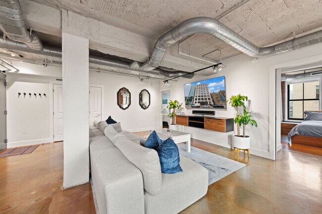 Building Photo - Fully Furnished Designer Loft with Parking & Monument Views!