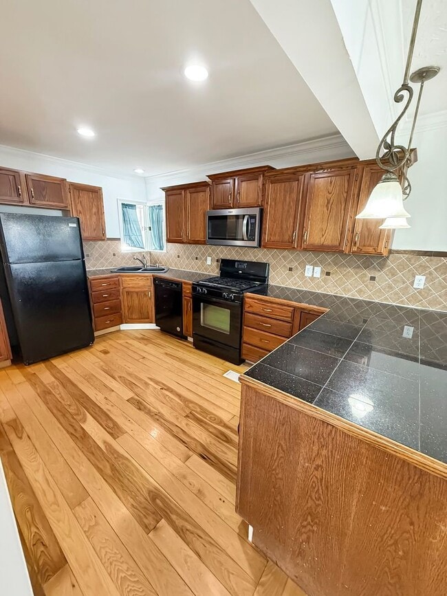 Building Photo - Charming West Tulsa Bungalow with Detached Garage and Hardwood Floors