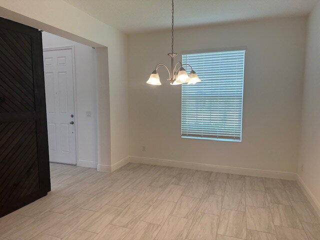 Building Photo - "Spacious Elegance in St. Cloud: 5-Bedroom...