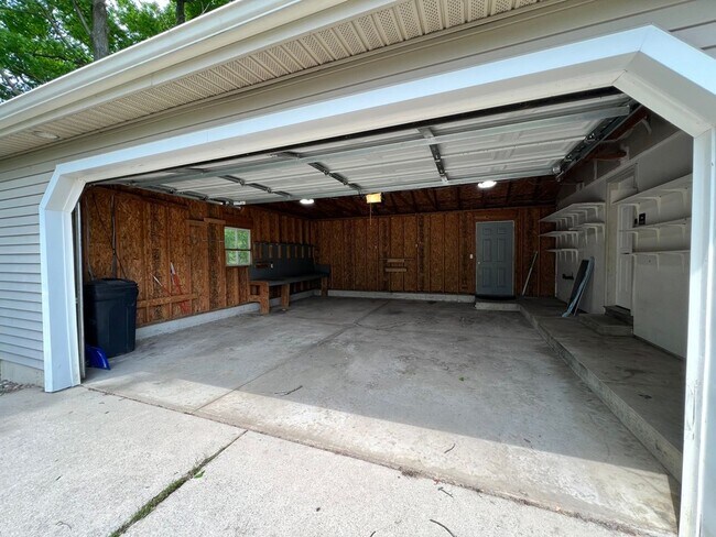 Building Photo - Spacious 3BR Duplex with Finished Basement & 2-Car Garage in Otsego