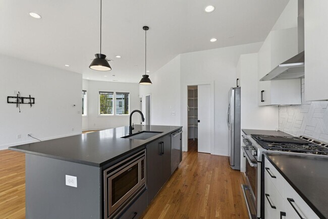 Building Photo - Beautiful 3-BR Property with Rooftop Deck!