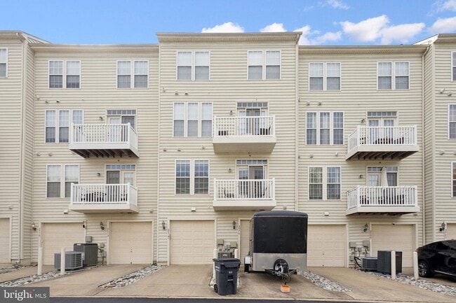 Building Photo - Welcome to Potomac Club—an amenity-packed, gated community!