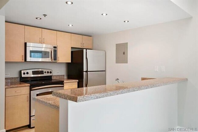 Building Photo - Urban Living in the Heart of Little Italy – 2 Bed / 1 Bath Condo at Acqua Vista
