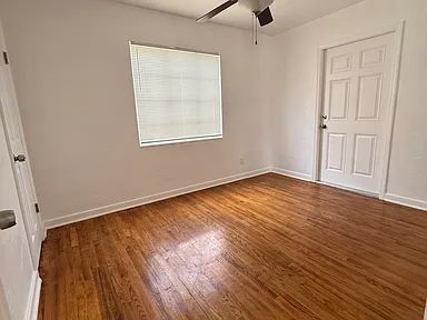 Building Photo - Charming Centrally Located Home | Wood Floors + Fenced Yard