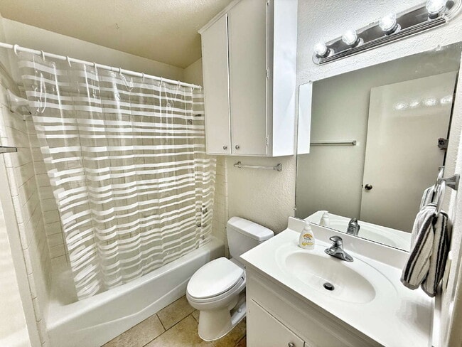 Building Photo - Prime Location! Fresh Paint – Charming 2BR...