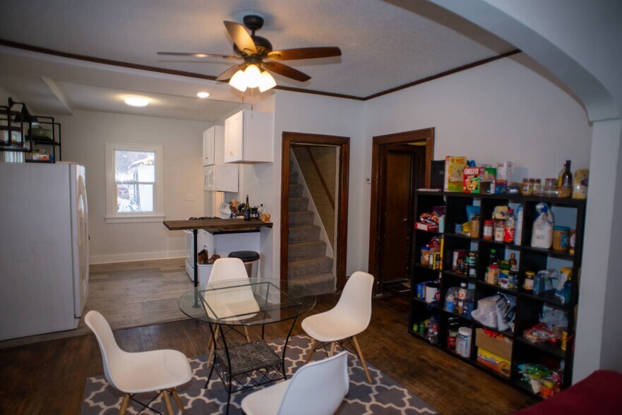 Dining room with open floorplan to kitchen and living room. - 103 Warwick St SE