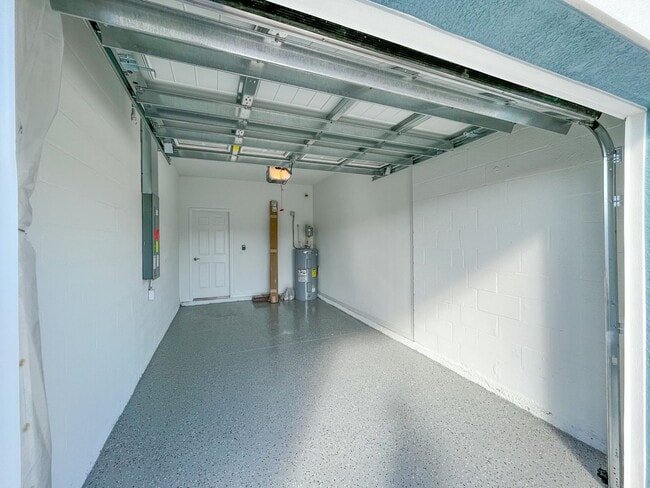 Building Photo - Townhome with garage, excellent location, community pool and more