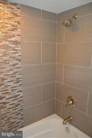 Fully Renovated / Finished Full Bathroom in Basement - 316 Division Ave NE