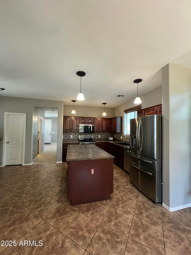 Building Photo - 14711 W Riviera Dr
