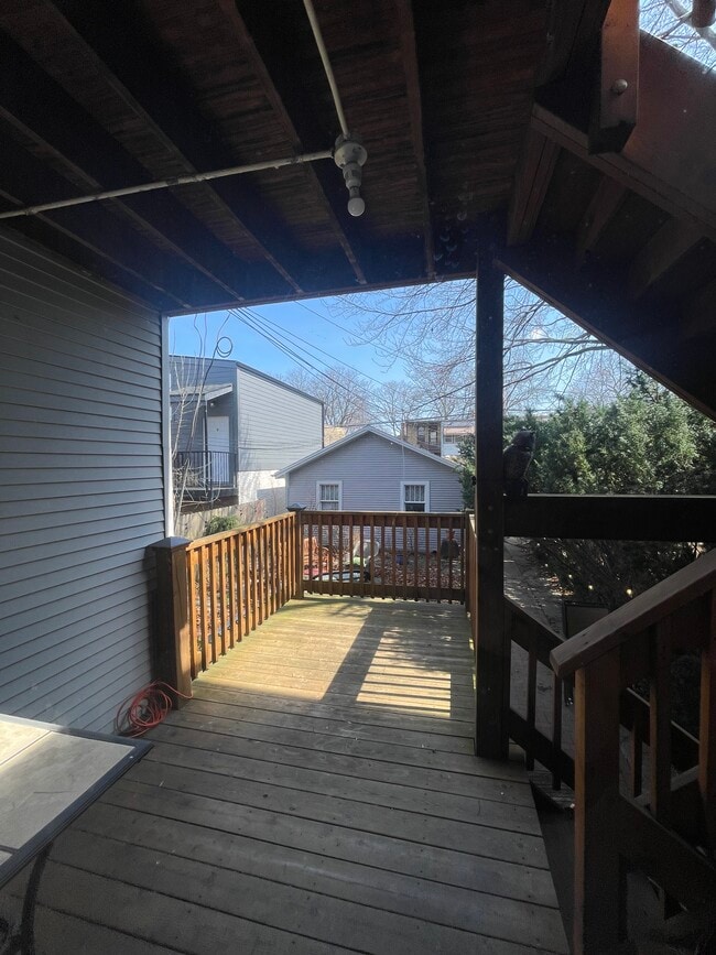 Private deck off kitchen overlooking yard - 5735 N Washtenaw Ave