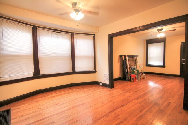 Building Photo - This 2 bedroom 1 bath home has been completely refinished with brilliant hardwood floors throughout!