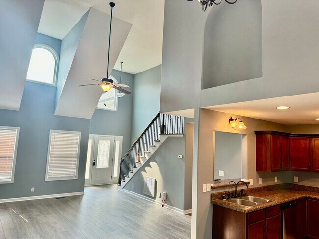 Building Photo - Large Open 4 Bedroom Home with Bonus! Tree Lined Backyard with Privacy Fence!