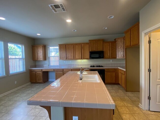 Building Photo - EXCEPTIONAL 4 BEDROOMS, 3 BATH, 3 CAR GARA...