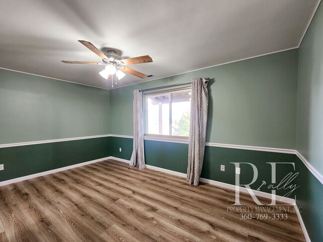 Building Photo - Rambler with 2-Car Garage, RV/Boat Parking...