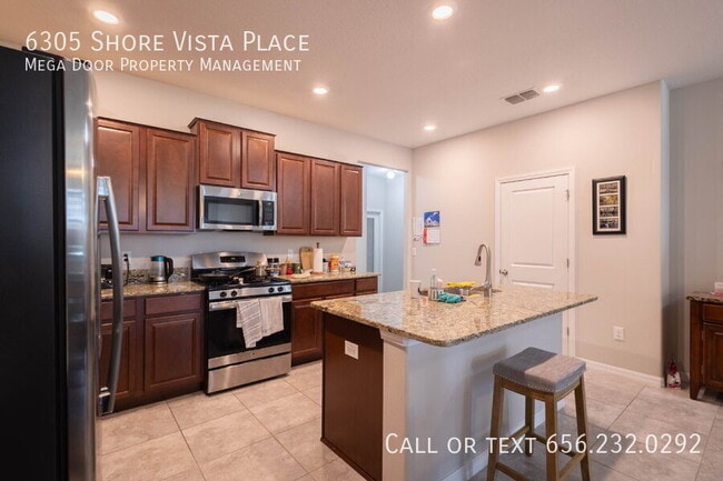 Building Photo - 6305 Shore Vista Pl