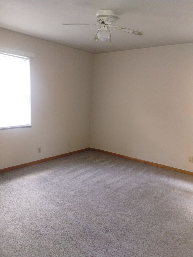 Building Photo - Quaint Duplex with a private Basement, Garage Space & Patio