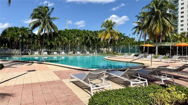 Building Photo - 19380 Collins Ave