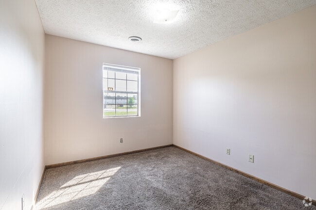 2BR, 1BA - 700SF - Bedroom - Riverside Apartments