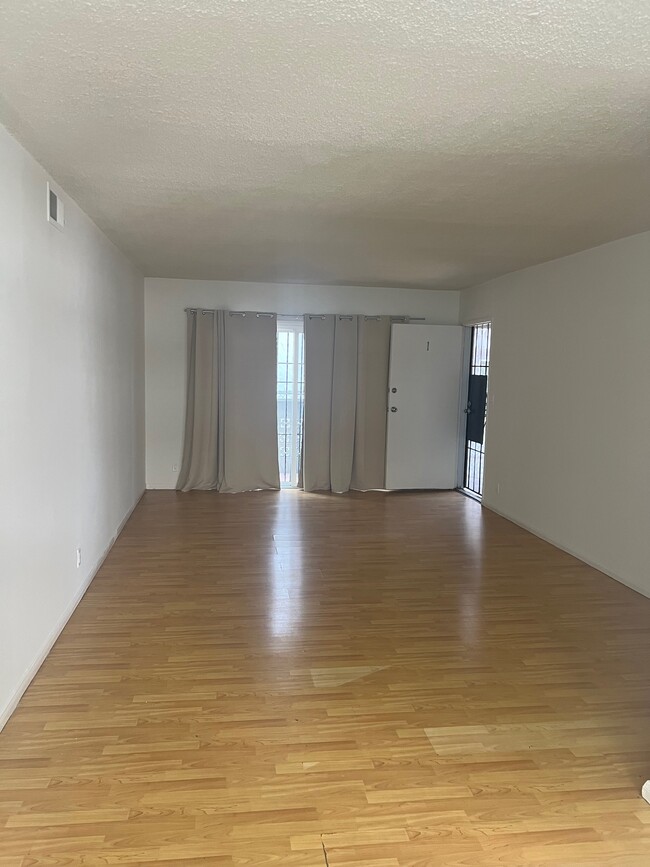 Living room and entry door - 1937 S Bedford St