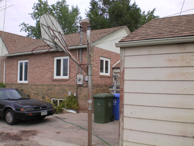 alleyway beside garage - 444 N Custer Ave