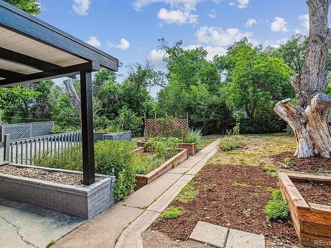 Building Photo - Quiet, Tree-Shaded Mid-Mod Steps to Downtown Littleton. Gorgeous Remodel.