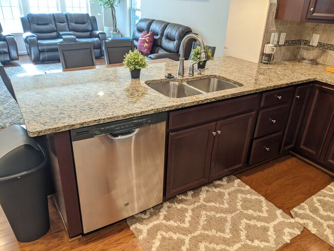 Building Photo - Bottom level (two story) *END UNIT* condo ...