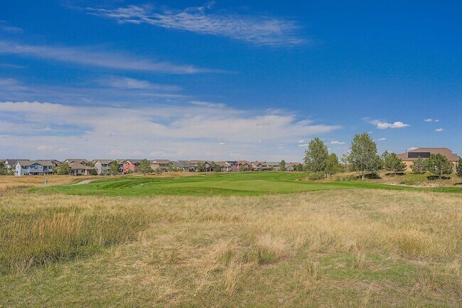 Building Photo - Beautifully maintained 5-bedroom home with a large finished basement, club access, and top-rated ...