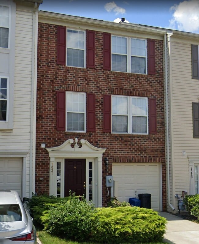 Font of Property with Parking Space in front of the Garage - 7021 Holly Springs Ln