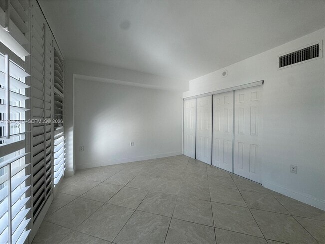 Building Photo - 10275 Collins Ave