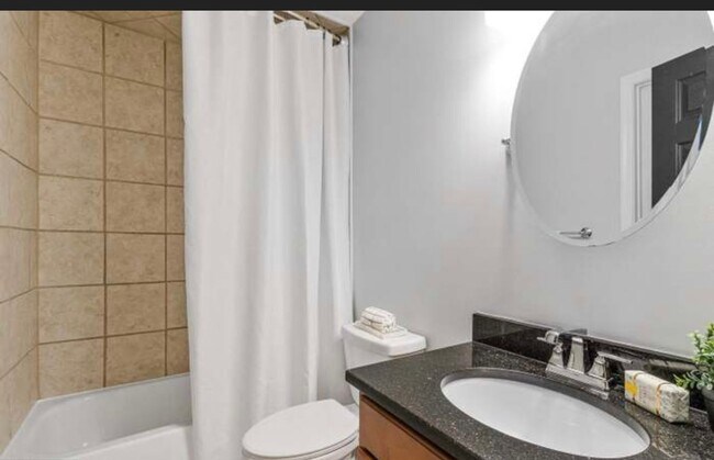 Building Photo - Bright, modern Capitol Hill 1 bed/1 bath condo with private outdoor space and secured parking