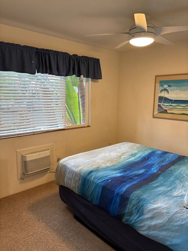 Building Photo - Move-In Ready 2BR/2BA Condo – Fully Furnished, AC, Washer/Dryer, Parking