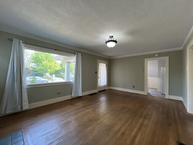 Building Photo - Charming Portland Home with Original Hardwood Floors, Finished Basement & Large Kitchen