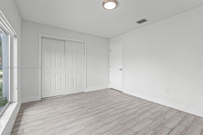 Building Photo - 9021 NW 7th Ct