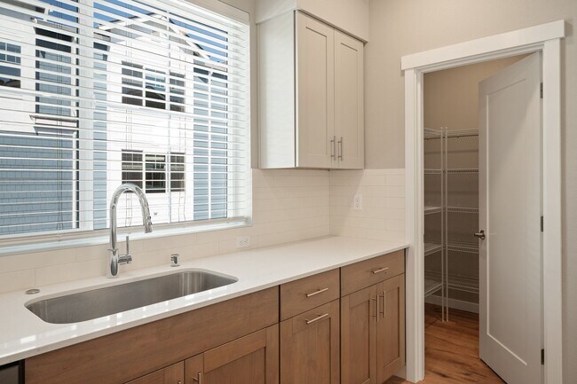 Building Photo - NEW CONSTRUCTION – Stylish 4-Bedroom Townh...