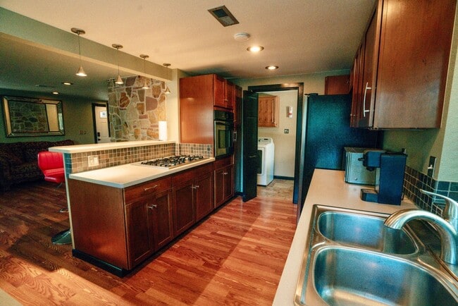 Building Photo - Modern 4BR Lakewood Home on Nearly Half an...