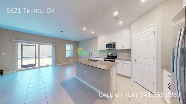 Building Photo - 5621 Tripoli Dr