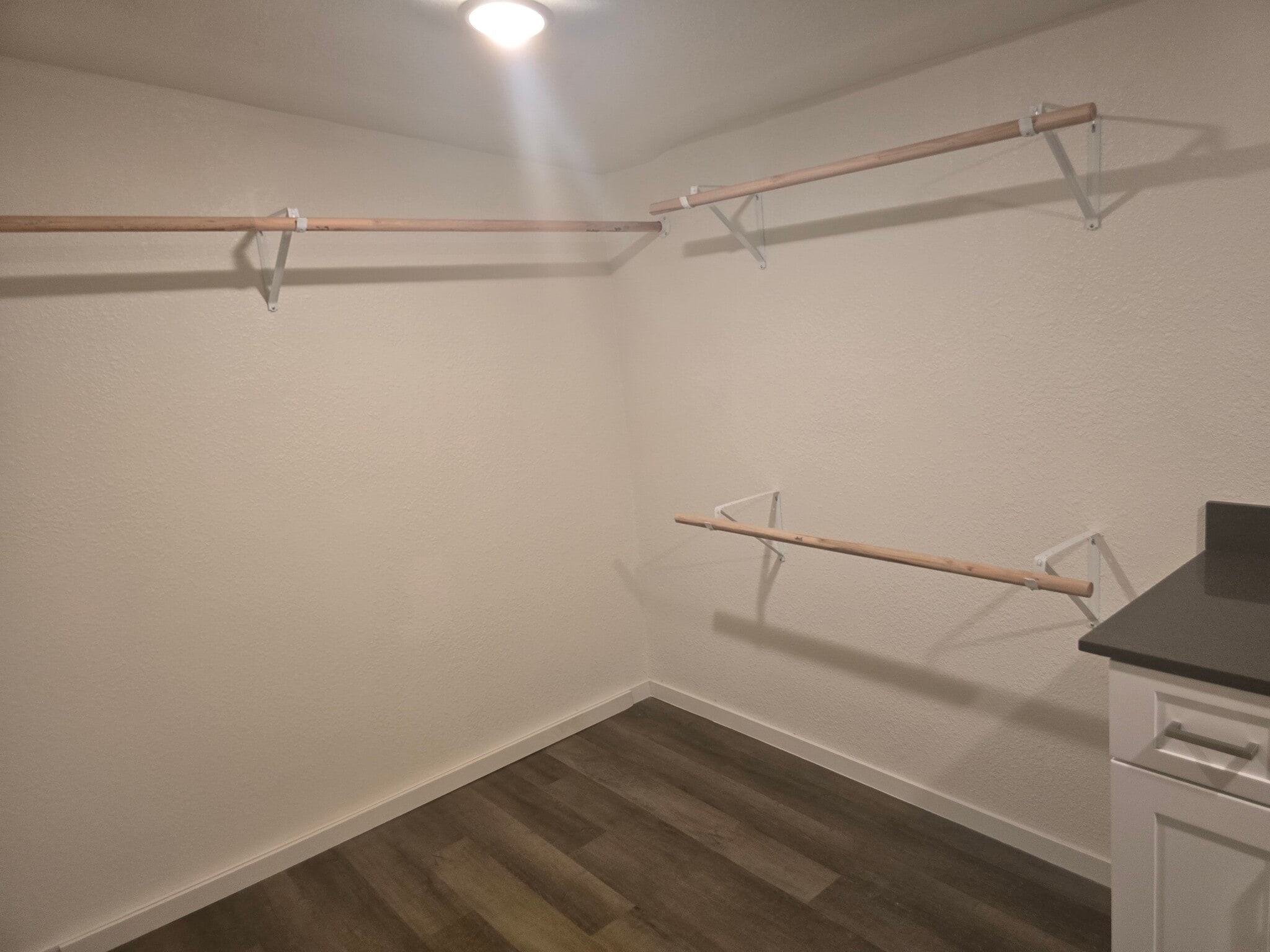 Primary walk in closet with utility - 804 Avenue E