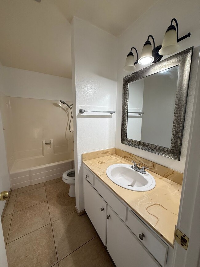 Building Photo - Long term Condo