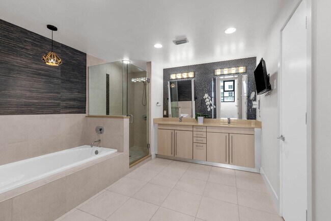 Building Photo - “Sleek Design Meets Walkable Downtown Livi...