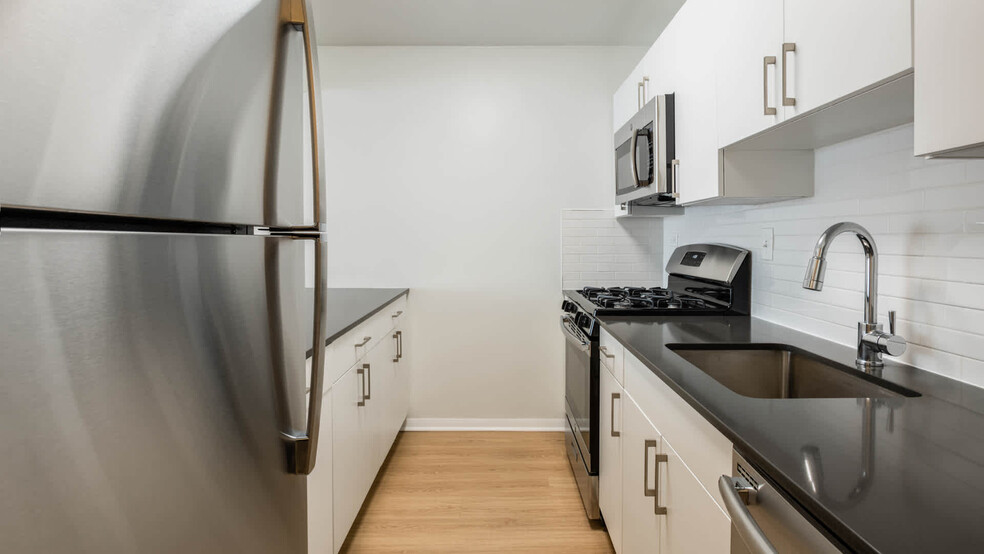 Kitchen with Stainless Steel Appliances - Emerson Place