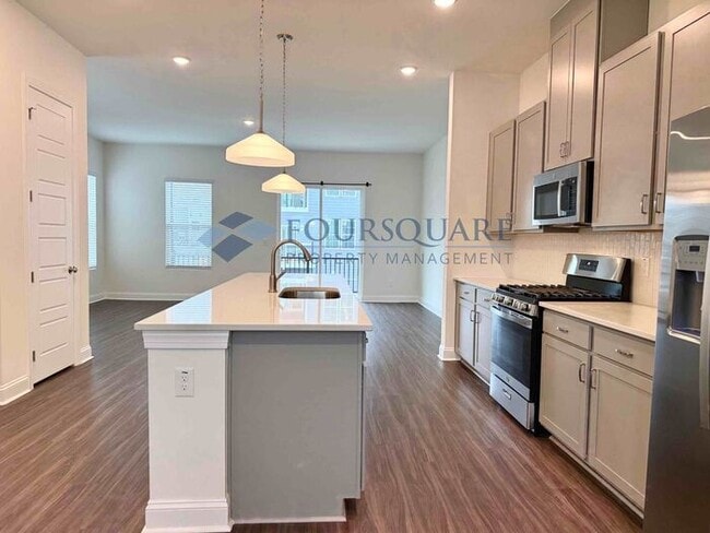 Building Photo - Bright End-Unit 3-Bed / 2.5-Bath Townhome with Flex Space, Gourmet Kitchen & 2-Car Garage – Walka...