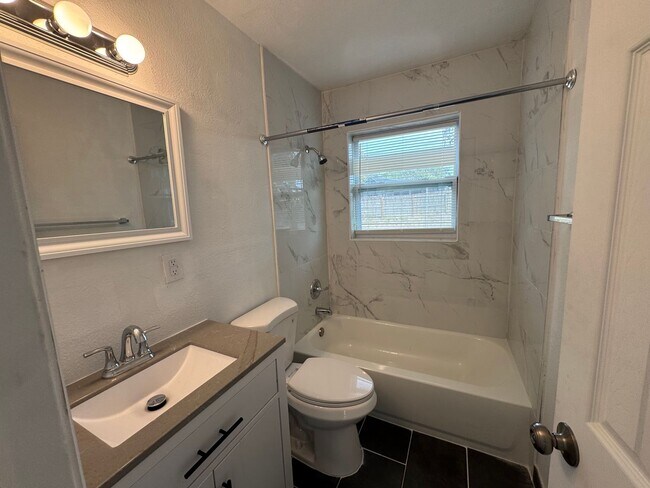 Building Photo - Recently Renovated 4/2 Home with Open Layout & Huge Backyard