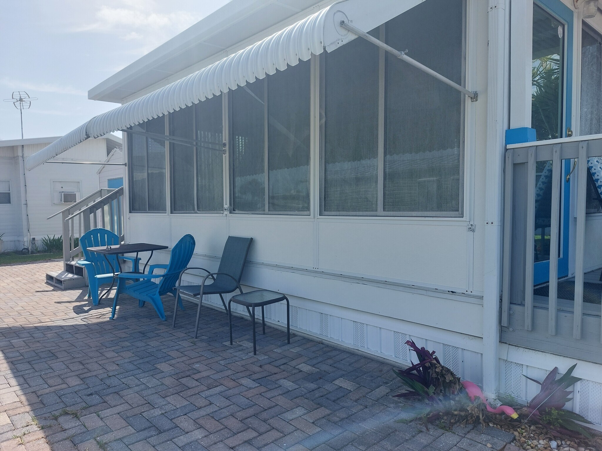 Out door sitting area, storm shutters - 1475 Flamingo Dr