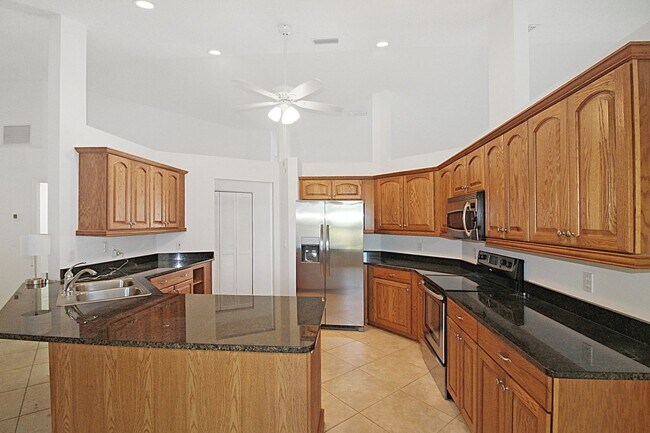 Building Photo - Lakes of Jacaranda Annual Home for Rent