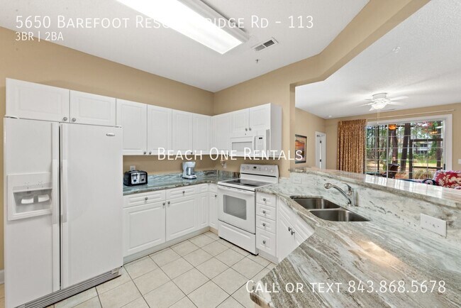 Building Photo - 5650 Barefoot Resort Bridge Rd