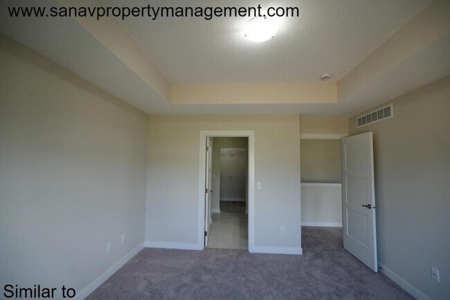 Building Photo - "Contemporary Ranch-Style Living: Immacula...